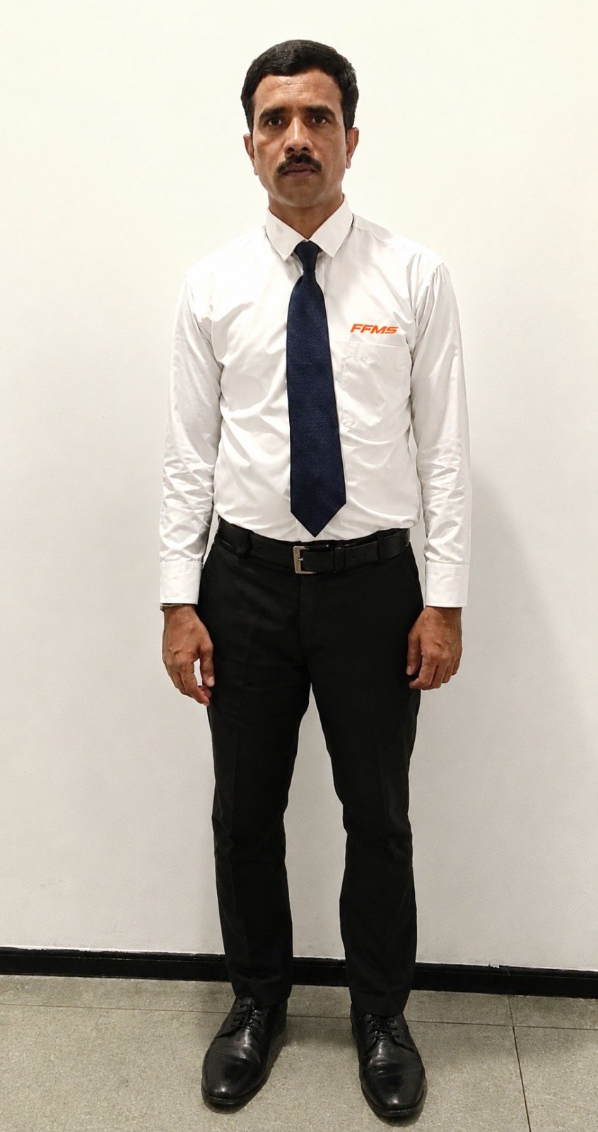 Fortis team member in formal uniform
